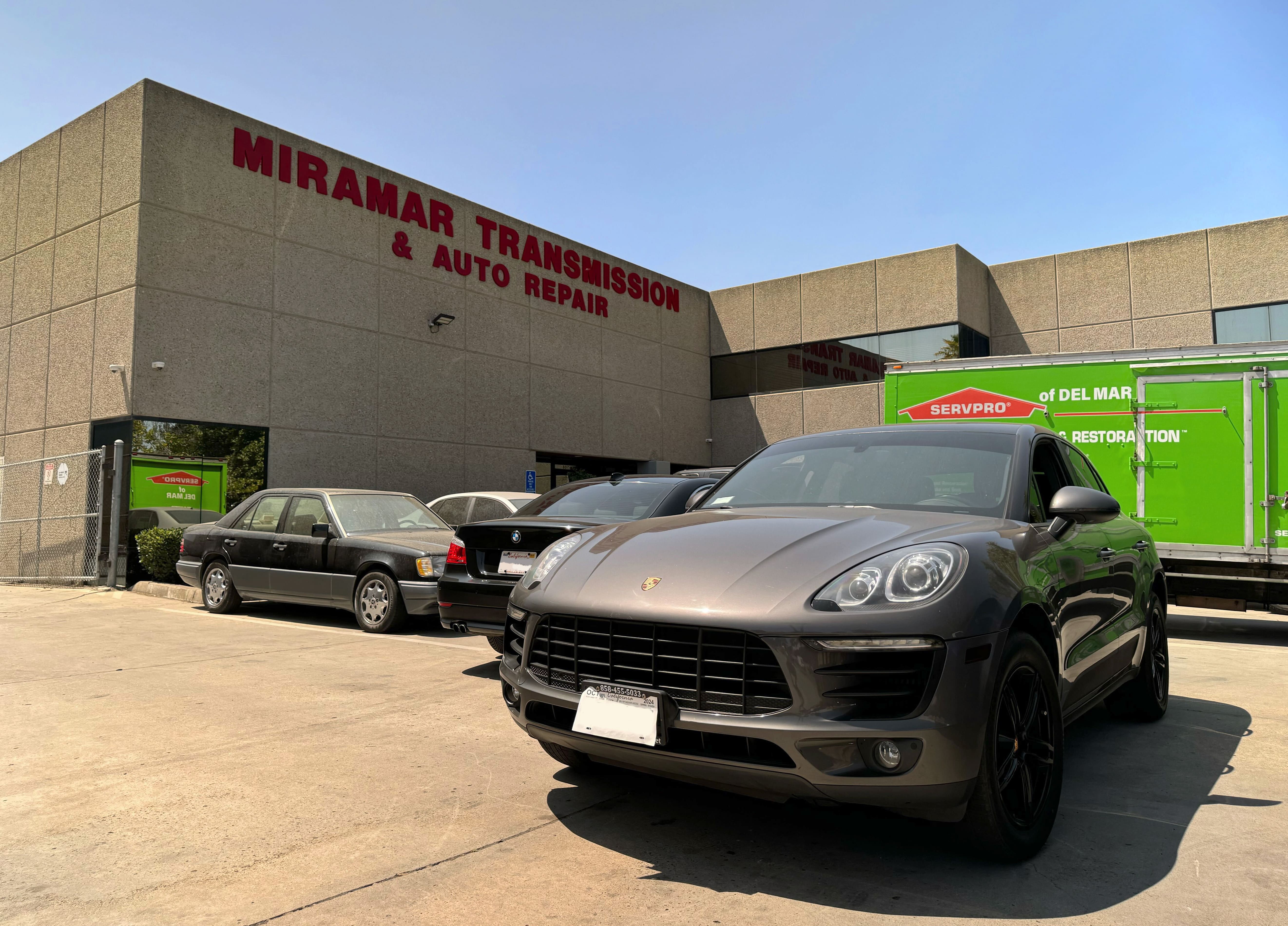 Miramar Transmission & Auto Repair storefront in San Diego, with customer vehicles outside